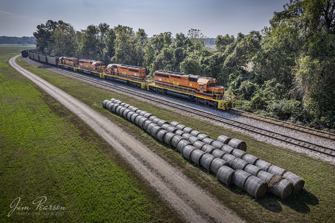Fellow railfans Cooper Smith, Ryan Scott and I spent about 5 hours railfanning southern Indiana on October 9th, 2021 and were fortunate enough to catch 5 different railroads operating in the area! We caught RJ Corman, Canadian Pacific, (Cooper and I), CSX, Norfolk Southern, Indiana Southern and Ryan caught BNSF for his fifth railroad. A great day of railfanning!

Here we find Indiana Southern Railroad (ISRR) 3371, 3388, 3372 and 3387, as they lead an empty coal train north, past Thomas Siding at Washington Township, Indiana, as the crew takes the train to Elnora, IN where they tied it down for the Indiana Railroad (INRD) to pick up. The INRD crew will then take the train on their railroad to Bear Run Mine at Carlisle, IN for another load of coal for the Petersburg Generating Station at Petersburg, IN.

According to Wikipedia: The Indiana Southern Railroad (reporting mark ISRR) is a short line or Class III railroad operating in the United States state of Indiana. It began operations in 1992 as a RailTex property and was acquired by RailAmerica in 2000. RailAmerica was itself acquired by Genesee & Wyoming in December 2012. They operate 186 miles of track from Indianapolis to Evansville, Indiana.

Tech Info: DJI Mavic Air 2S Drone, RAW, 22mm, f/2.8, 1/4000, ISO 110.

#trainphotography #railroadphotography #trains #railways #dronephotography #trainphotographer #railroadphotographer #jimpearsonphotography