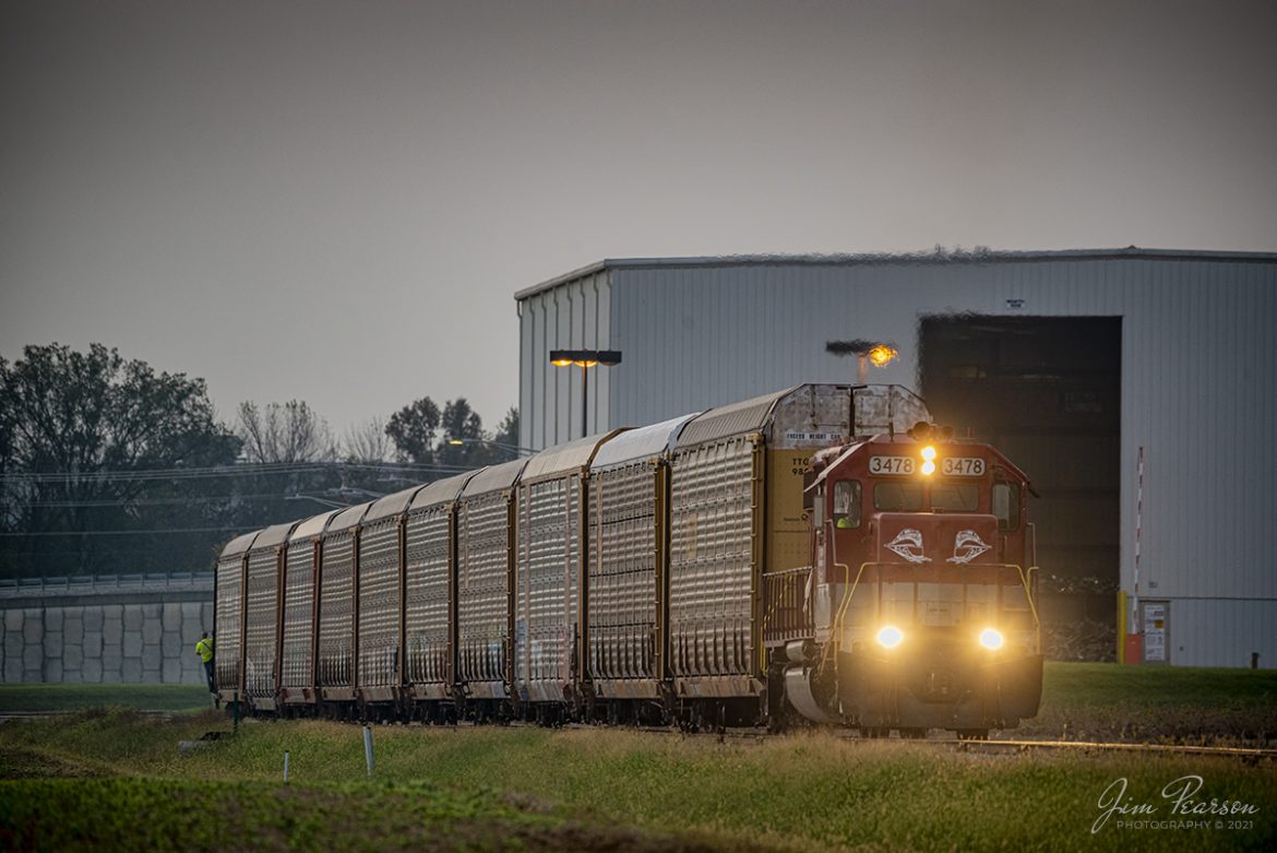 The second railroad I caught while spending 5 hours railfanning in southern Indiana on October 9th, 2021, was RJ Corman 3478 as it backed a string of autoracks back to the Toyota Plant just before sunrise at Princeton, Indiana.

According to Wikipedia: R.J. Corman Railroad Group, LLC is a privately owned railroad services and short line operating company headquartered in Nicholasville, KY, with field locations in 23 states. It was owned by Richard J. Corman, who established the company in 1973, and ran it until his death on August 23, 2013. The company owns eleven short-line railroads spanning Indiana, Kentucky, Mississippi, North Carolina, Ohio, Pennsylvania, South Carolina, Tennessee, Texas, and West Virginia. 

The company serves all seven Class I railroads, many regional and short line railroads as well as various rail-served industries. These operations encompass an array of services, including railroad construction, short line railroad operations, dispatch, industrial switching services, emergency response, track material logistics, distribution centers, signal design and construction, building eco-friendly locomotives, railroad worker training and an excursion dinner train.

Tech Info: Nikon D800, RAW, Sigma 150-600 @ 550mm, f/6.3, 1/160, ISO 1000.

#trainphotography #railroadphotography #trains #railways #jimpearsonphotography #trainphotographer #railroadphotographer