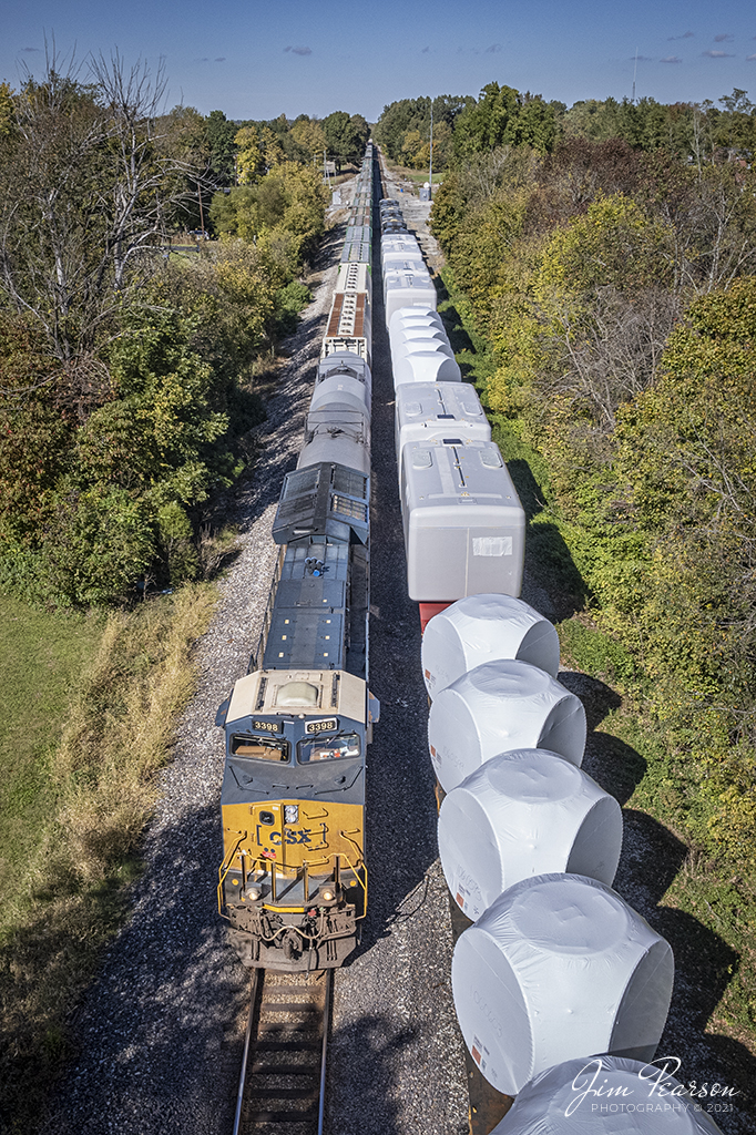 CSXT 3398 leads CSX 513 as it passes windmill parts train W986 tied down in the siding at Hanson, Kentucky, as it heads south on the Henderson Subdivision, with a 10,980-foot train, as the fall colors begin to show in the landscape on October 21st, 2021.

Tech Info: DJI Mavic Air 2S Drone, RAW, 22mm, f/2.8, 1/2500, ISO 100.

#trainphotography #railroadphotography #trains #railways #dronephotography #trainphotographer #railroadphotographer #jimpearsonphotography