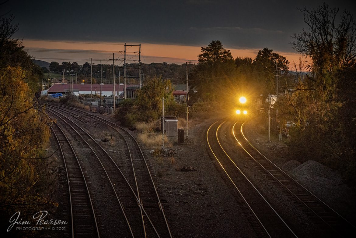 Norfolk Southern 9790 leads a westbound intermodal on the NS Reading Number 2 line as it approaches the George Street overpass at Reading, Pennsylvania as the last light of day rakes across the scene on November 4th, 2021. This location is where the Pottsville Branch main starts off the Reading line and heads into the NS Reading Yard.

Tech Info: Nikon D800, RAW, Sigma 24-70 @ 70mm, f/4.5, 1/200, ISO 6400.

#trainphotography #railroadphotography #trains #railways #jimpearsonphotography #trainphotographer #railroadphotographer