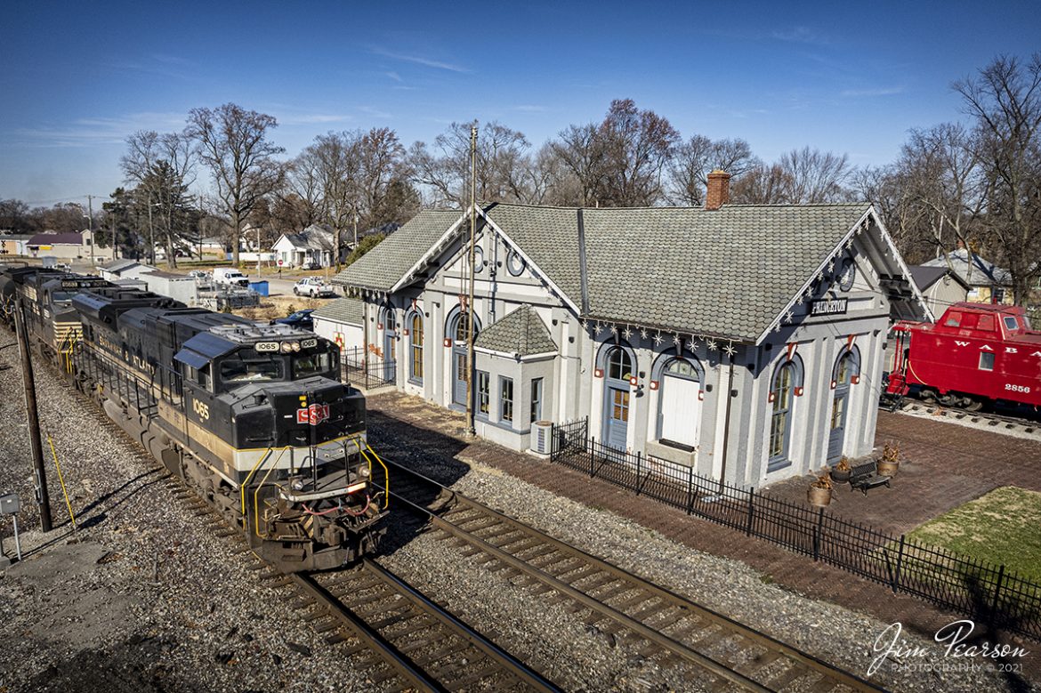 Norfolk Southern railway Savannah & Atlanta 1065 Heritage Unit leads NS 167 as it passes the restored depot at Princeton, Indiana, on its way east along the NS East-West District on December 3rd, 2021. This unit completes my goal of photographing all the 20 NS Heritage units! 

According to the NS Website: Savannah & Atlanta Railway (SR, EMD) began life as the Brinson Railway in 1906, slowly expanding from Savannah toward the Northwest. It was consolidated with other small railroads to become the Savannah & Atlanta in 1917. Central of Georgia bought the S&A in 1951.

According to the Gibson County website: Constructed in 1875 and beautifully restored, the Princeton Depot is the only remaining depot structure in Gibson County. Once housing the C&EI and L&N railways, it was the lifeline of commerce and transportation for the county. Passenger service was discontinued from the depot in late 1960. Today the depot stands as a nostalgic reminder of the importance railroads have played in Gibson County's history.

The Princeton Train Depot is now home to the Gibson County Visitors Center and features a railway museum with a restored WABASH train caboose.

Tech Info: DJI Mavic Air 2S Drone, RAW, 22mm, f/2.8, 1/2500, ISO 120.

#trainphotography #railroadphotography #trains #railways #dronephotography #trainphotographer #railroadphotographer #jimpearsonphotography