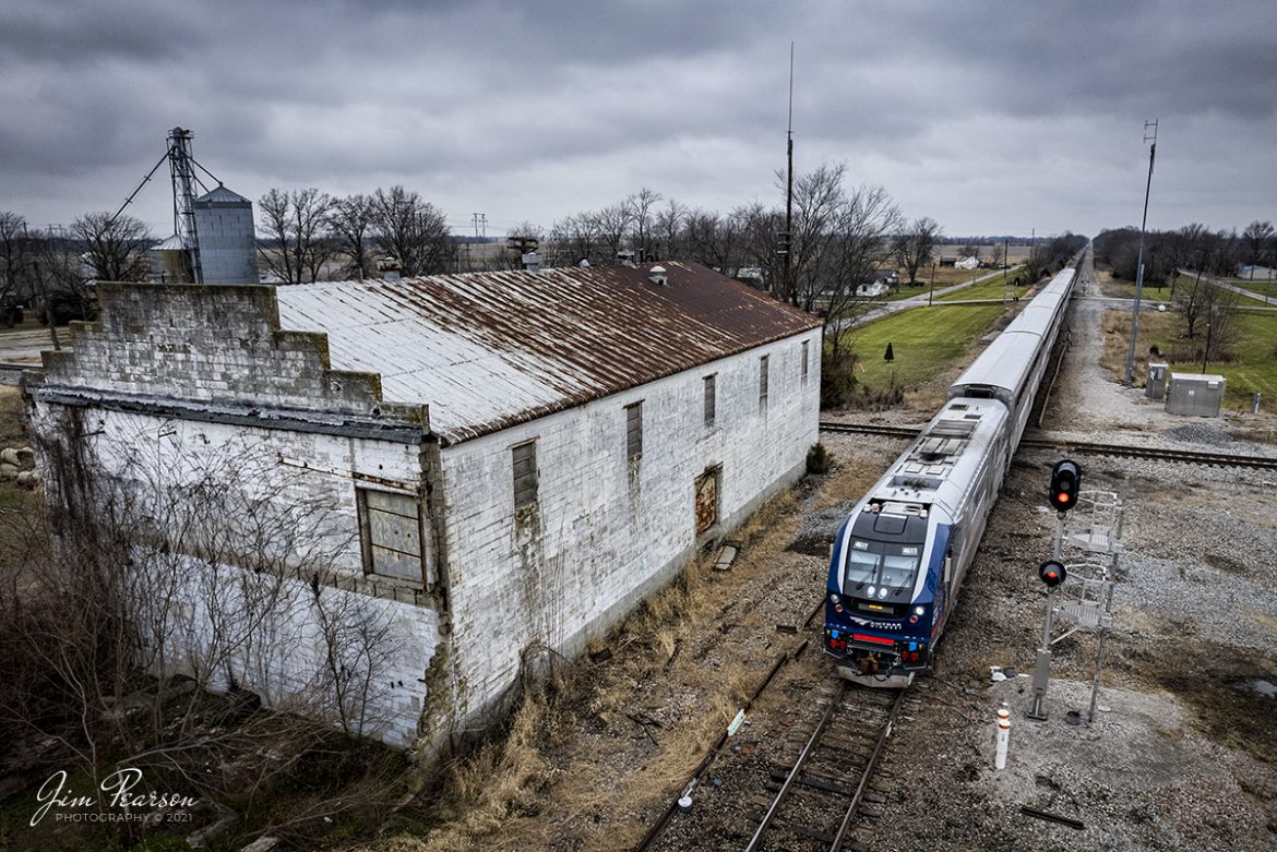 Amtrak 391, the Saluki, passes through the Evansville Western Railway/Canadian National diamond as it heads south on the CN Centralia Subdivision at Ashley, Illinois on December 29th, 2021.

According to Wikipedia: Ashley is a city in Washington County, Illinois, United States, and was named after Colonel L. W. Ashley, a railroad division engineer with the Illinois Central Railroad.

Tech Info: DJI Mavic Air 2S Drone, RAW, 22mm, f/2.8, 1/500, ISO 130.

#trainphotography #railroadphotography #trains #railways #dronephotography #trainphotographer #railroadphotographer #jimpearsonphotography