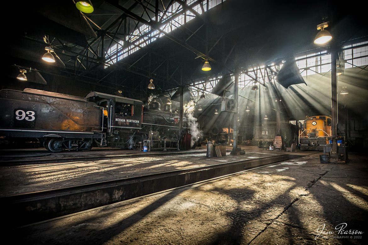 Nevada Northern Railway engine 93 sits quietly chuffing away, as beams of sunlight stream through the engine house windows after another day of work at Ely, Nevada on February 11th, 2022. 

Locomotive #93 is a 2-8-0 that was built by the American Locomotive Company in January of 1909 at a cost of $17,610. It was the last steam locomotive to retire from original revenue service on the Nevada Northern Railway in 1961 and was restored to service in 1993.

According to Wikipedia: The Nevada Northern Railway Museum is a railroad museum and heritage railroad located in Ely, Nevada and operated by a historic foundation dedicated to the preservation of the Nevada Northern Railway.

Tech Info: Nikon D800, RAW, Nikon 10-24mm @ 10mm, f/4.5, 1/320, ISO 1000.

#trainphotography #railroadphotography #trains #railways #jimpearsonphotography #trainphotographer #railroadphotographer #steamtrains #nevadanorthernrailway