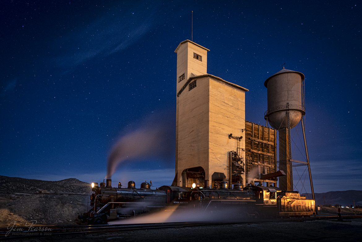 Nevada Northern Railway steam locomotives 93 and 81 pose next to the coaling tower and water tank in the year during the museums Winter Photo Charter at Ely, Nevada, under a cold, but beautiful starry night on February 11th, 2022 .

Locomotive #93 is a 2-8-0 that was built by the American Locomotive Company in January of 1909 at a cost of $17,610. It was the last steam locomotive to retire from original revenue service on the Nevada Northern Railway in 1961 and was restored to service in 1993.

The Nevada Northern No. 81 is a "Consolidation" type (2-8-0) steam locomotive it was built for the Nevada Northern in 1917 by the Baldwin Locomotive Works in Philadelphia, PA, at a cost of $23,700. It was built for Mixed service to haul both freight and passenger trains on the Nevada Northern railway.

According to Wikipedia: The Nevada Northern Railway Museum is a railroad museum and heritage railroad located in Ely, Nevada and operated by a historic foundation dedicated to the preservation of the Nevada Northern Railway.

Tech Info: Nikon D800, RAW, Nikon 10-24mm @ 15mm, f/4, 25 seconds, ISO 320.

#trainphotography #railroadphotography #trains #railways #jimpearsonphotography #trainphotographer #railroadphotographer