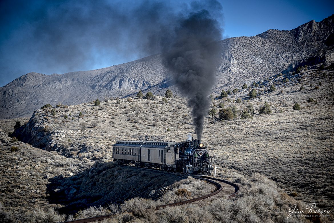 Nevada Northern Railway #81 runs with a short passenger train through Moser Cut on the high line as it heads toward the the Steptoe Valley and Ely, Nevada on February 13th, 2022 during the museums winter photo charter event.

Nevada Northern No. 81 is a "Consolidation" type (2-8-0) steam locomotive that was built for the Nevada Northern in 1917 by the Baldwin Locomotive Works in Philadelphia, PA, at a cost of $23,700. It was built for Mixed service to haul both freight and passenger trains on the Nevada Northern railway.

According to Wikipedia: The Nevada Northern Railway Museum is a railroad museum and heritage railroad located in Ely, Nevada and operated by a historic foundation dedicated to the preservation of the Nevada Northern Railway.

Tech Info: Nikon D800, RAW, Nikon 70-300mm @ 112mm, f/4.8, 1/2000, ISO 320.

#trainphotography #railroadphotography #trains #railways #jimpearsonphotography #trainphotographer #railroadphotographer #steamtrains #nevadanorthernrailway