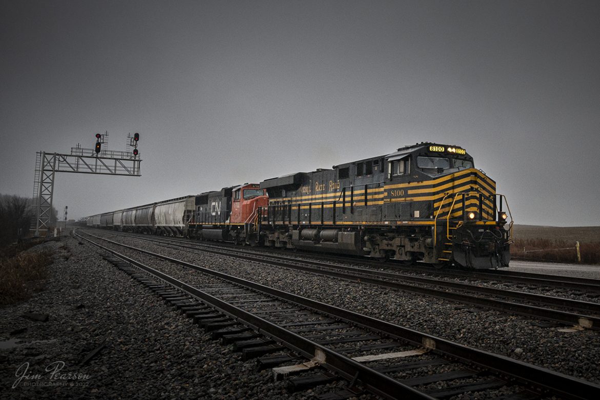 Norfolk Southern Heritage unit 8100, Nickel Plate Road, and Canadian National 5702 lead CSX Q512-24 (Radnor Yard - Nashville, TN - Avon, IN Daily) pulls up the Casky lead as it heads north into the yard at Casky to pick up 10 loads of truck frames at Hopkinsville, Kentucky on the CSX Henderson Subdivision on February 24th, 2022.

One of the things I like about railfanning the Henderson Subdivision is because we get all kinds of interesting and different foreign power that runs up and down the line! While most of it is CSX, we do get a mix of just about every major railroad on this line at some point in time during each week. You never know when its coming, but when it does as with this unit, railfans gather along the tracks for their own crack at capturing their own images of the move and Im no exception!

While you cant control the weather for these shots, railroads operate in all kinds of weather and so Im trackside when the train is! Hardest thing about shooting in bad weather is getting out the door in my opinion! A large golf umbrella helps a lot!!

Tech Info: Nikon D800, RAW, Nikon 10-24mm @ 16mm, f/4.5, 1/800, ISO 720.

#trainphotography #railroadphotography #trains #railways #jimpearsonphotography #trainphotographer #railroadphotographer