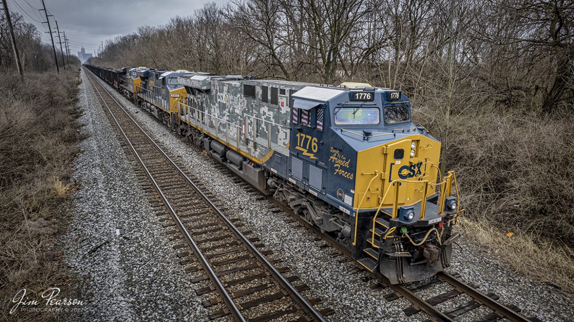 On March 19th, 2022 CSX E895 with 1776, CSXs Spirit of our Armed Forces unit sits tied down east of Avon yard at Craft Runner outside of Indianapolis, Indiana on the Indianapolis Terminal Subdivision. This is one of three specialty painted units done by CSXT honoring troops, first responders and Law Enforcement. I had hoped to chase it moving south to Princeton, IN where it will load their train, but it didnt happen until after dark.

According to the CSXT website: new spirit of service and gratitude is rolling across the CSX rail network in the form of three locomotives that have been repainted and renamed in honor of our nations military and first responders.

The one-of-a-kind locomotives  the Spirit of our Armed Forces, the Spirit of our First Responders and the Spirit of our Law Enforcement  are helping promote the CSX Pride in Service program, a signature community investment initiative with a goal of positively impacting 100,000 military service members, veterans, first responders and their families by 2020.

Tech Info: DJI Mavic Air 2S Drone, RAW, 22mm, f/2.8, 1/250, ISO 200

#trainphotography #railroadphotography #trains #railways #dronephotography #trainphotographer #railroadphotographer #jimpearsonphotography