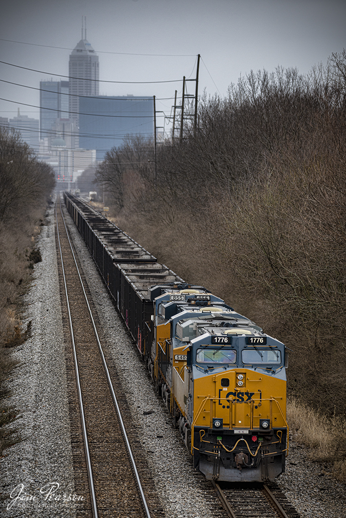 On March 19th, 2022, CSX E895 with 1776, CSX's Spirit of our Armed Forces unit sits tied down east of Avon yard at Craft Runner outside of Indianapolis, Indiana on the Indianapolis Terminal Subdivision. This is one of three specialty painted units done by CSXT honoring troops, first responders and Law Enforcement. I had hoped to chase it moving south to Princeton, IN where it will load their train, but it didnt happen until after dark.

According to the CSXT website: new spirit of service and gratitude is rolling across the CSX rail network in the form of three locomotives that have been repainted and renamed in honor of our nation's military and first responders.

The one-of-a-kind locomotives - the Spirit of our Armed Forces, the Spirit of our First Responders, and the Spirit of our Law Enforcement - are helping promote the CSX Pride in Service program, a signature community investment initiative with a goal of positively impacting 100,000 military service members, veterans, first responders and their families by 2020.

Tech Info: Nikon D800, RAW, Sigma 150-600 @ 240mm, f/5.3, 1/400, ISO 180.

#trainphotography #railroadphotography #trains #railways #jimpearsonphotography #trainphotographer #railroadphotographer