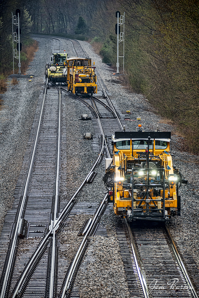 What appears to be a CSX Harsco Mark IV tamper leads the way as it and other equipment make their way through the crossovers at Nortonville, Kentucky on the CSX Henderson Subdivision on April 5th, 2022, after finishing some track work between Romney and Oak Hill on the Henderson Subdivision.

Tech Info: Nikon D800, RAW, Sigma 150-600 @ 280mm, f/5.6, 1/500, ISO 2000.

#trainphotography #railroadphotography #trains #railways #jimpearsonphotography #trainphotographer #railroadphotographer