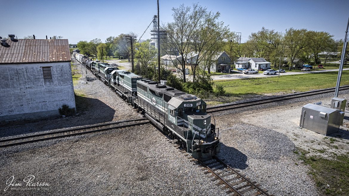 Evansville Western Railway 2115 leads the way as it heads south over the Canadian Nationals Centralia Subdivision in downtown Ashley, Illinois as it makes its way back to Mount Vernon, IN after working the Agripride Grainery in Nashville, IL on April 27th, 2022.

The Evansville Western Railway (reporting mark EVWR) is a Class III common carrier shortline railroad operating in the southern Illinois and Indiana region. It is one of three regional railroad subsidiaries owned and operated by Paducah and Louisville Railway Transportation.

Tech Info: DJI Mavic Air 2S Drone, RAW, 22mm, f/2.8, 1/2500, ISO 150.

#trainphotography #railroadphotography #trains #railways #dronephotography #trainphotographer #railroadphotographer #jimpearsonphotography