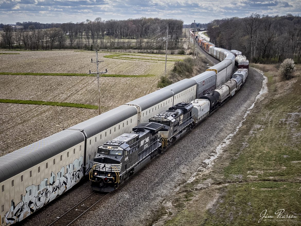 April 9, 2022 - Norfolk Southern 110 meets 125 as they snake along passing each other on the NS East District at East Douglas just outside of Princeton, Indiana.

Tech Info: DJI Mavic Air 2S Drone, RAW, 22mm, f/2.8, 1/200, ISO 200.

#trainphotography #railroadphotography #trains #railways #dronephotography #trainphotographer #railroadphotographer #jimpearsonphotography