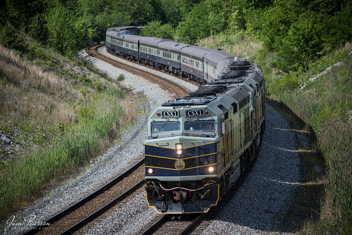 May 12, 2022 - CSX P001-09 Presidential Office Car passenger train heads through the S curve at Nortonville, Kentucky, with CSXT 1, 2 and 3 leading the way, southbound on the Henderson Subdivision.

CSX Transportation has repainted 3 of its executive fleet F40PH locomotives in a paint scheme inspired by predecessor Baltimore & Ohio and a fleet of cars to finish out the train set. The city of Baltimore chartered the railroad on Feb. 28, 1827, to build west to a suitable point on the Ohio River. Ground was broken on July 4, 1828, at Carrollton, Md. By 1929 the railroad operated 5,658 miles of track and had 2,364 locomotives. In the 1970s the B&O became part of Chessie System and in the 1980s it became part of CSX.

Tech Info: Nikon D800, RAW, Sigma 150-600 @ 220mm, f/5.3, 1/2000, ISO 560.

#trainphotography #railroadphotography #trains #railways #jimpearsonphotography #trainphotographer #railroadphotographer