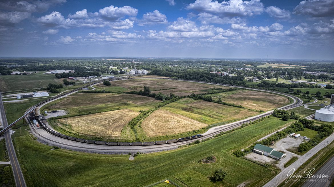 CSX E305 with CSXT 989 and 277 leading, pulls around the Alliance Coal Loop at Princeton, Indiana on June 16th, 2022, in preparation for loading its train with coal on the CSX CE&D subdivision.

Tech Info: DJI Mavic Air 2S Drone, Altitude 270ft, RAW, 22mm, f/2.8, 1/2500, ISO 110.

#trainphotography #railroadphotography #trains #railways #dronephotography #trainphotographer #railroadphotographer #jimpearsonphotography
