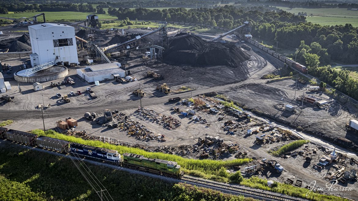 Several firsts for me in this latest drone image from June 24th, 2022, at Warrior Coal Loop outside Nebo, Kentucky! On this Norfolk Southern coal train, we find NS Illinois Terminal Heritage Unit 1072 leading with Paducah and Louisville University of Kentucky locomotive, 4522 trailing, as they prepare to load an empty coal drag, with NS Southern Heritage Unit 8114 bringing up the rear as the DPU. 

This was my first time catching a coal train with a heritage unit leading and as a DPU on the rear, plus doing so on the Paducah and Louisville Railway with one of the University of Kentucky units in the consist! Pretty cool!

Tech Info: DJI Mavic Air 2S Drone, RAW, 22mm, f/2.8, 1/1250, ISO 100.

#trainphotography #railroadphotography #trains #railways #dronephotography #trainphotographer #railroadphotographer #jimpearsonphotography