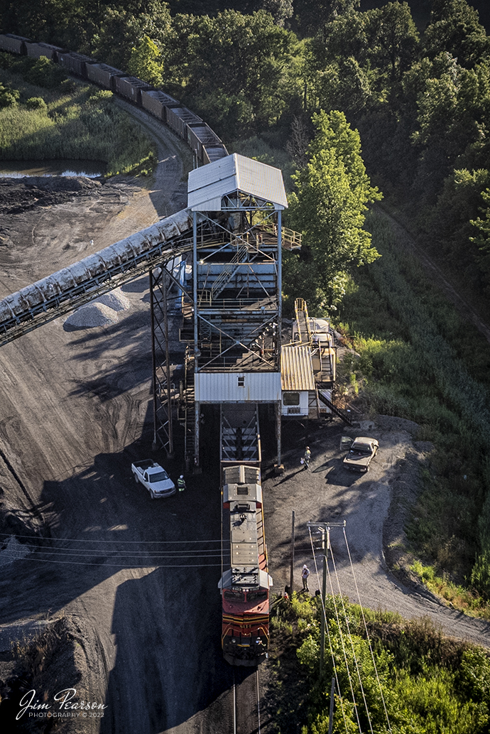 On June 24th, 2022, I caught Norfolk Southern Heritage unit 8114 "Norfolk Southern" as it prepared to begin loading at the Warrior Coal Loop outside Nebo, Kentucky! It;s one of 20 locomotives painted as Heritage units by NS. Its been just over 10 years since the first engine rolled out and I;ve been fortunate to have photographed all 20 of them out working on the road!

According to the NS website: As part of its 30th anniversary celebration in 2012, NS painted 20 new locomotives in the color schemes of predecessor railroads. The commemorative units quickly became known as NS' Heritage Locomotives.

Since the 1820s, hundreds of railroad companies were built, merged, reorganized, and consolidated into what eventually became Norfolk Southern, itself created from the consolidation of Southern Railway and Norfolk and Western Railway in 1982. In 1999, Norfolk Southern acquired a portion of Conrail. The Heritage Locomotives represent railroads that played significant roles in Norfolk Southerns history. The first unit, Conrail 8098, rolled out of Altoona, Pa., March 15, and the final one, Lackawanna 1074, rolled out of Muncie, Ind., on June 27, 2012.

Each paint scheme was modified to fit contemporary locomotives while staying as true as possible to the original designs. Norfolk Southern employees in Altoona and Chattanooga, Tenn., painted GE ES44AC locomotives, while the EMD SD70ACe units were painted at Progress Rail Services; facility in Muncie, Ind. The Heritage Locomotives are used in freight service across Norfolk Southern;s 19,500-mile, 22-state network.

Tech Info: DJI Mavic Air 2S Drone, RAW, 22mm, f/2.8, 1/800, ISO 100.

#trainphotography #railroadphotography #trains #railways #dronephotography #trainphotographer #railroadphotographer #jimpearsonphotography