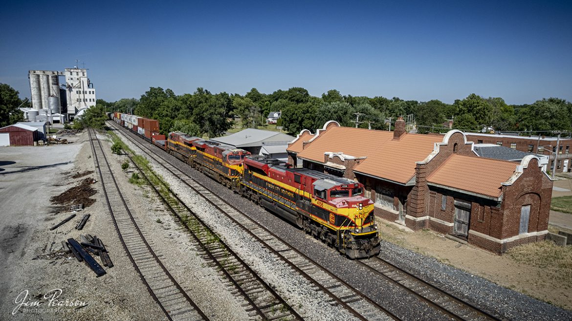 After spending a couple days railfanning the Kansas City areas, myself and fellow railfan Ryan Scott of SteelRails started our trip back home and decided to railfan our way back which brought us to this scene at Marshall, Missouri on the afternoon of June 30th, 2022.

We came here to try and catch something coming through the flyover here where the UP and KCS cross each other, but never made it to the location because we heard from a fellow railfan, Drew Davison, there was a westbound Kansas City Southern fright headed to Marshall. We decided to wait here to get a shot of it passing the old Chicago and Alton Depot here at Marshall. Now, we didnt expect a 3-4 hour wait, but thats what it turned out to be, but the shot was well worth it!

According to the website roadtrippers.com, The Chicago and Alton Depot, also known as the Illinois Central Gulf Depot, is a historic train station located at Marshall, Saline County, Missouri. It was designed by the noted architect Jarvis Hunt and built in 1906 by the Chicago and Alton Railroad. It is a one-story, brick and stone building with Jacobethan Revival and Mission Revival style design elements. The building measures approximately 113 feet 2 inches in length and 42 feet 11 inches wide. It was added to the National Register of Historic Places in 1979.

Tech Info: DJI Mavic Air 2S Drone, RAW, 22mm, f/2.8, 1/2500, ISO 100.

#trainphotography #railroadphotography #trains #railways #dronephotography #trainphotographer #railroadphotographer #jimpearsonphotography