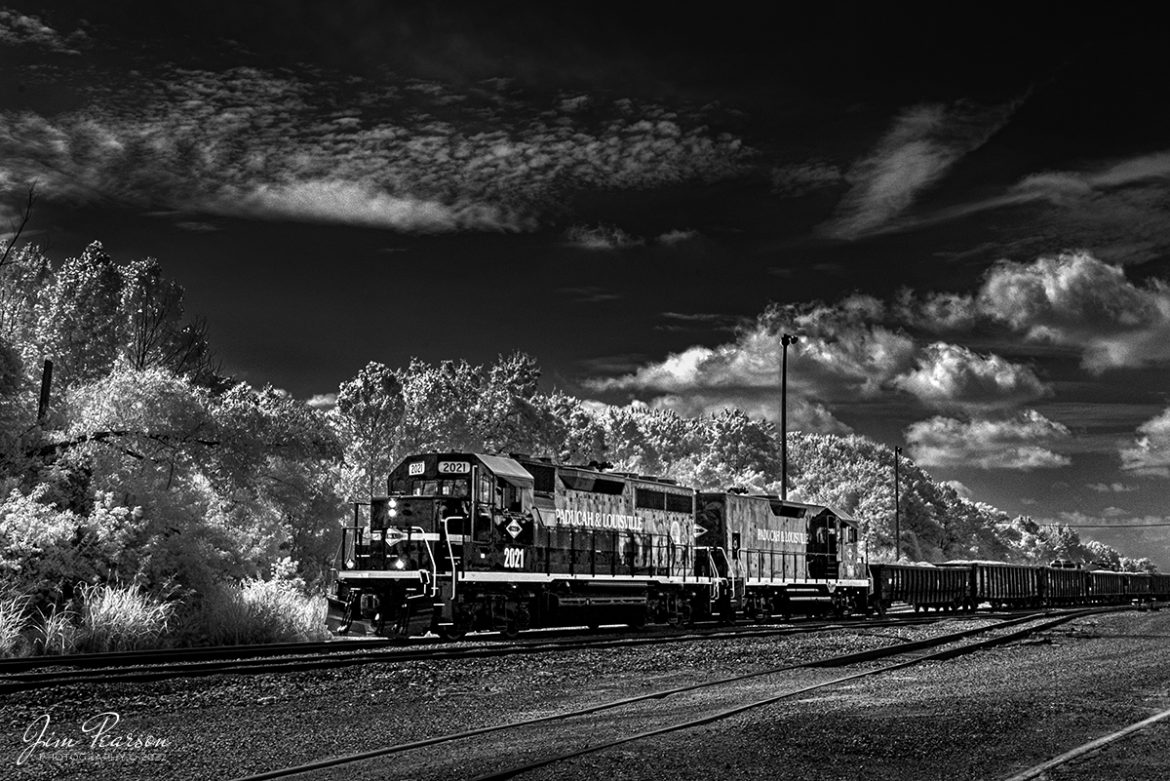 Paducah & Louisville Railway 35th Anniversary units, 2021 and 1986 work at the north end of the yard in this Infrared photo from July 8th, 2022, at Paducah, Kentucky.

The two engines have been painted in colors and scheme closely matching the original PAL paint scheme from 1986 and are in celebration of the 35th anniversary of the Paducah and Louisville Railway.

Tech Info: Fuji XT-1, RAW, Converted to 720nm B&W IR, Nikon 10-24 @ 24mm, f/7.1, 1/250, ISO 200.

#trainphotography #railroadphotography #trains #railways #jimpearsonphotography #infraredtrainphotography #infraredphotography #trainphotographer #railroadphotographer #irphotography