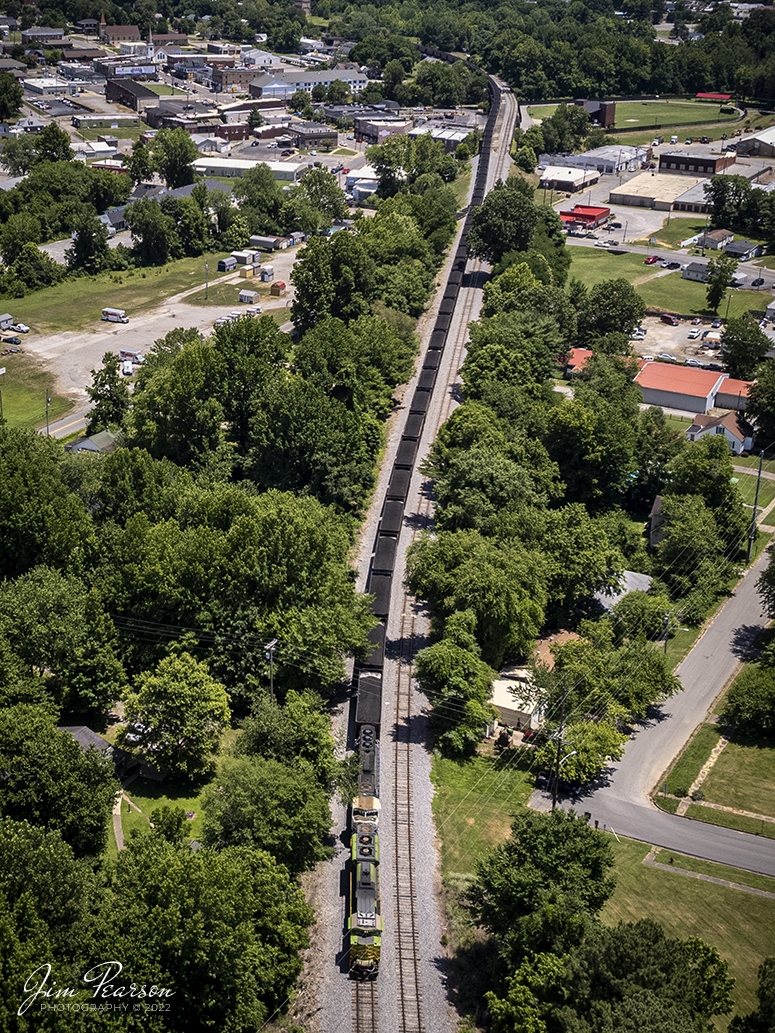 Norfolk Southern Heritage 1072 “Illinois Terminal” locomotive and Paducah and Louisville Railway University of Kentucky locomotive 4522, brings up the rear of a loaded coal train as they head north at Central City, Kentucky on June 24th, 2022, with a load for the Louisville Gas and Electric power plant, outside Louisville, KY.

Tech Info: DJI Mavic Air 2S Drone, RAW, 22mm, f/2.8, 1/1600, ISO 110.

#trainphotography #railroadphotography #trains #railways #dronephotography #trainphotographer #railroadphotographer #jimpearsonphotography