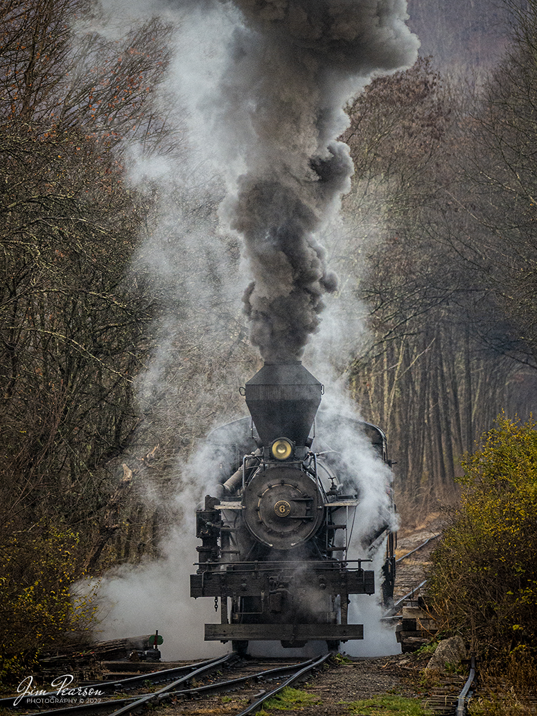 Meadow River Lumber Company steam locomotive, Heisler No. 6, backs down to the wye at Durban, West Virginia, to pick up a set of freight cars, during the Mountain Rail WV, Rail Heritage Photography Weekend. The event was held at the Durbin & Greenbrier Valley Railroad, Durbin, WV, and Cass Scenic Railroad, Cass, WV, from November 4-6th, 2022. Heisler No. 6 was built in 1929 and is a Class C-90 locomotive with 3 trucks.

According to Wikipedia: The Durbin and Greenbrier Valley Railroad (reporting mark DGVR) is a heritage and freight railroad in the U.S. states of Virginia and West Virginia. It operates the West Virginia State Rail Authority-owned Durbin Railroad and West Virginia Central Railroad (reporting mark WVC), as well as the Shenandoah Valley Railroad in Virginia.

Beginning in 2015, DGVR began operating the historic geared steam-powered Cass Scenic Railroad, which was previously operated by the West Virginia Division of Natural Resources as part of Cass Scenic Railroad State Park.

Tech Info: Nikon D800, RAW, Sigma 150-600mm @ 270mm, f/5.6, 1/800, ISO 2800.

#trainphotography #railroadphotography #trains #railways #dronephotography #trainphotographer #railroadphotographer #jimpearsonphotography #cassscenicrailway #durbinandgreenbriervalleyrr #trainsfromtheair	#steamtrains