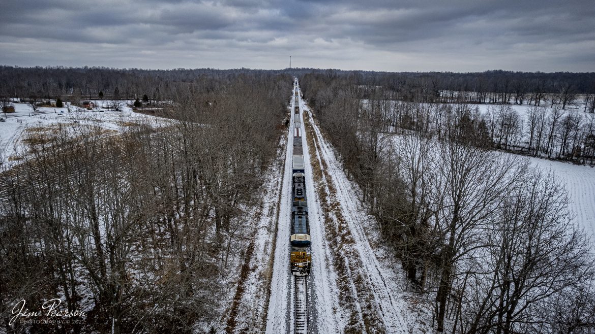 CSXT 5274 leads M501 (Barr Yard - Chicago, IL to Radnor Yard - Nashville, TN) heads south on the Earlington Cutoff, that runs around downtown Earlington and Madisonville, KY on a cold winters evening, as it heads for Nashville, TN on the Henderson Subdivision, December 27th, 2022.

Tech Info: DJI Mavic Air 2S Drone, 22mm, f/2.8, 1/640, ISO 120.

#trainphotography #railroadphotography #trains #railways #dronephotography #trainphotographer #railroadphotographer #jimpearsonphotography #trainsfromtheair