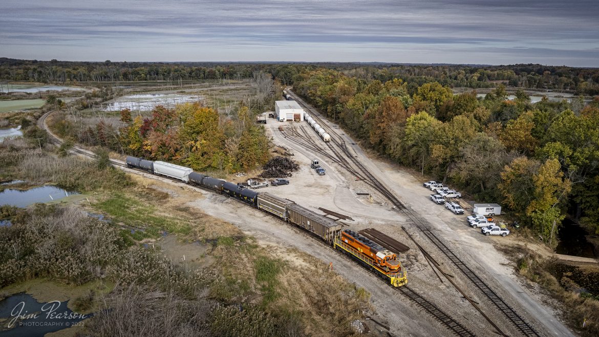 Indiana Southern railroad locomotive 3387 leads the morning local pulls into the Algers, Winslow and Western Railway (AWW) yard (now belongs to Norfolk Southern Railway) at Oakland City, Indiana to do its interchange work on October 20th, 2022.

According to Wikipedia: The Indiana Southern Railroad (reporting mark ISRR) is a short line or Class III railroad operating in the United States state of Indiana. It began operations in 1992 as a RailTex property,[1] and was acquired by RailAmerica in 2000. RailAmerica was itself acquired by Genesee & Wyoming in December 2012.

The Algers, Winslow and Western Railway (reporting mark AWW) was a Class III short-line railroad that served the surface mining operations in Pike County, Indiana. It operated approximately 19 miles of track which reached from the coal mines west of Cato south to those at Enos Corner and ran close to the Norfolk Southern Railway and Indiana Southern Railroad. It was acquired in March 2007 by Norfolk Southern, but still operating under the original company's name.

Tech Info: DJI Mavic Air 2S Drone, 22mm, f/2.8, 1/1500, ISO 130.

#trainphotography #railroadphotography #trains #railways #dronephotography #trainphotographer #railroadphotographer #jimpearsonphotography #indianasouthernrailroad #indianarailroads #trainsfromtheair
