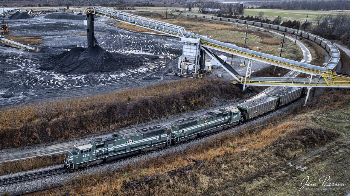 Paducah and Louisville Railways 4516 and 4503 pull their empty coal train through the Warrior Coal Mine loop, outside of Nebo, Kentucky as they prepare to load their train, bound for the Louisville Gas & Electric power plant, outside of Louisville, Ky on January 12th, 2023.

Tech Info: DJI Mavic Air 2S Drone, RAW, 22mm, f/2.8, 1/60, ISO 100, -.7 stop.

#trainphotography #railroadphotography #trains #railways #dronephotography #trainphotographer #railroadphotographer #jimpearsonphotography #lentuckytrains #paducahandlouisvillerailway