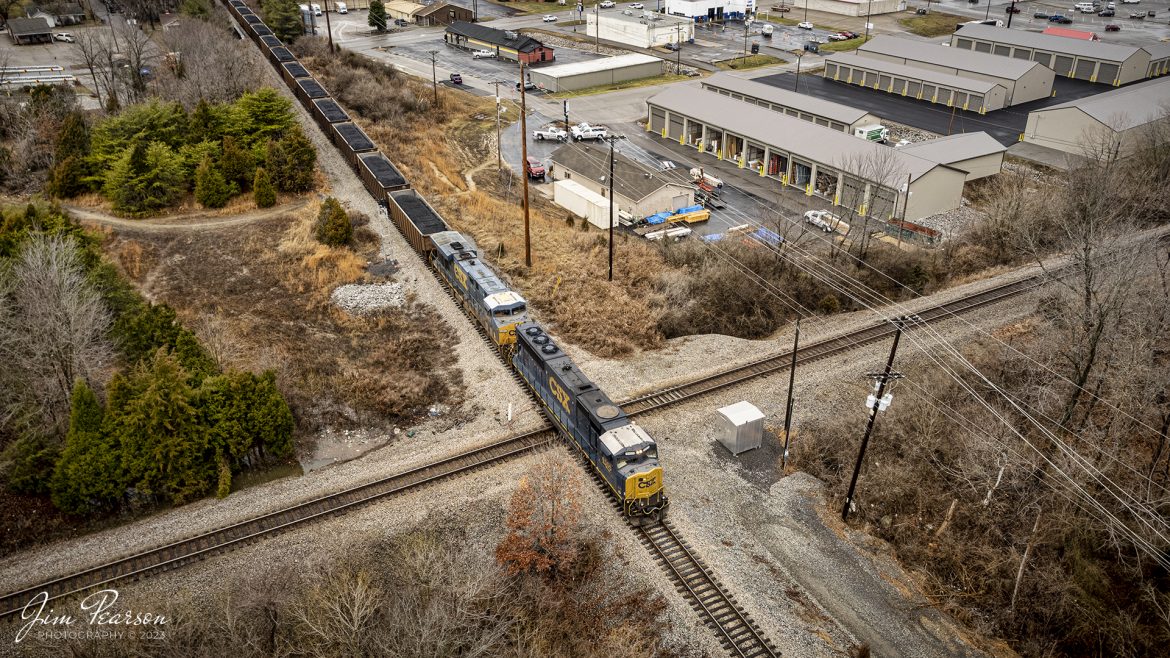 CSX C002 crosses over the diamond at Trident on the Henderson Subdivision, after coming off the Morganfield Branch after picking up a load of coal from Warrior Coal mine, as they head into CSX Atkinson Yard at Madisonville, Ky on January 25th, 2023. 

Tech Info: DJI Mavic Air 2S Drone, RAW, 22mm, f/2.8, 1/120, ISO 120.

#trainphotography #railroadphotography #trains #railways #dronephotography #trainphotographer #railroadphotographer #jimpearsonphotography #trainsfromtheair #csxhendersonsubdivision #kentuckytrains