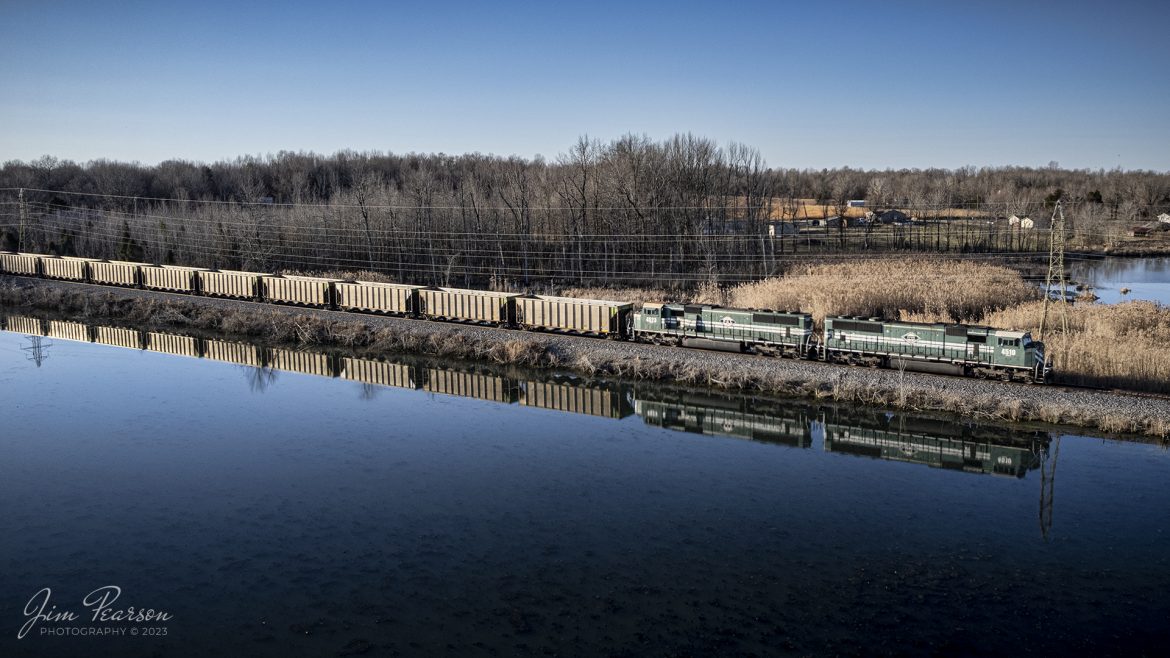 Evansville Western Railway 4510 and Paducah & Louisville Railway 4523 lead empty coal train WYX3 as it passes through the wetlands area on the way to pickup another load of coal at the Warrior Coal Mine loop outside of Nebo, Kentucky, on February 13th, 2023.

Tech Info: DJI Mavic Air 2S Drone, 22mm, f/2.8, 1/1000, ISO 100.

#trainphotography #railroadphotography #trains #railways #dronephotography #trainphotographer #railroadphotographer #jimpearsonphotography #csx #trainsfromadrone #kentuckytrains #paducahandlouisvillerailway #coaltrain #PAL