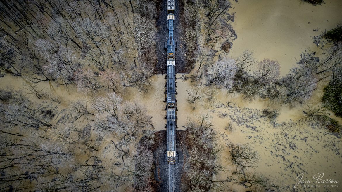 A trio of CSX units leads an empty coal train south over a flooded Richland Creek, at Richland, Kentucky, on the Paducah and Louisville Railway, on its way to Calvert City Terminal for a load of blended coal. 

Flooding throughout the region hindered railroad operations due to the storms that produced heavy rainfall as they swept through the region on February 16th, 2023.

Tech Info: DJI Mavic Air 2S Drone, 22mm, f/2.8, 1/320, ISO 110.

#trainphotography #railroadphotography #trains #railways #dronephotography #trainphotographer #railroadphotographer #jimpearsonphotography #coaltrain #csxrailway #palrailway #richlandky