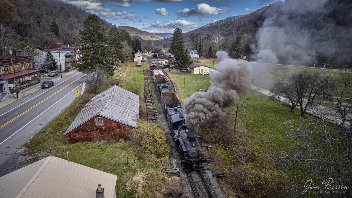 Meadow River Lumber Company steam locomotive, Heisler No. 6 pulls out of the station at Durban, West Virginia on November 4th, 2022, during the Mountain Rail WV, Rail Heritage Photography Weekend. The event was held at the Durbin & Greenbrier Valley Railroad, Durbin, WV, and Cass Scenic Railroad, Cass, WV, from November 4-6th, 2022. Heisler No. 6 was built in 1929 and is a Class C-90 locomotive with 3 trucks.

According to Wikipedia: The Durbin and Greenbrier Valley Railroad (reporting mark DGVR) is a heritage and freight railroad in the U.S. states of Virginia and West Virginia. It operates the West Virginia State Rail Authority-owned Durbin Railroad and West Virginia Central Railroad (reporting mark WVC), as well as the Shenandoah Valley Railroad in Virginia.

Tech Info: DJI Mavic Air 2S Drone, 22mm, f/2.8, 1/640, ISO 120.

#trainphotography #railroadphotography #trains #railways #dronephotography #trainphotographer #railroadphotographer #jimpearsonphotography #trainsfromtheair