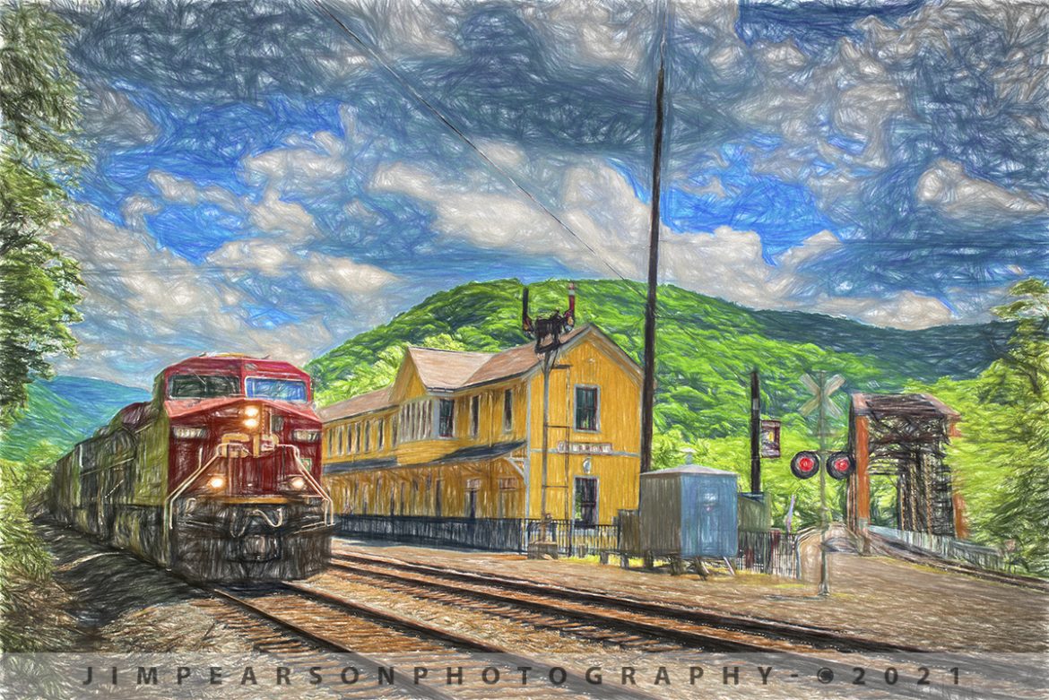 May 27, 2019 - Canadian Pacific 8867 pulls CSX V752-26 empty grain train westbound away from the Depot on the New River Subdivision at Thurmond, West Virginia. The line off to the right across the bridge is the RJ Corman West Virginia Line. 

According to Wikipedia,  Thurmond is a town in Fayette County, West Virginia, United States, on the New River. The population was five at the 2010 census. During the heyday of coal mining in the New River Gorge, Thurmond was a prosperous town with a number of businesses and facilities for the Chesapeake and Ohio Railway. The town was the filming location for John Sayles' 1987 movie Matewan since it still possesses many of the characteristics of a 1920s Appalachian coal town.

Today, much of Thurmond is owned by the National Park Service for the New River Gorge National River. The C&O passenger railway depot in town was renovated in 1995 and now functions as a Park Service visitor center. The entire town is a designated historic district on the National Register of Historic Places.