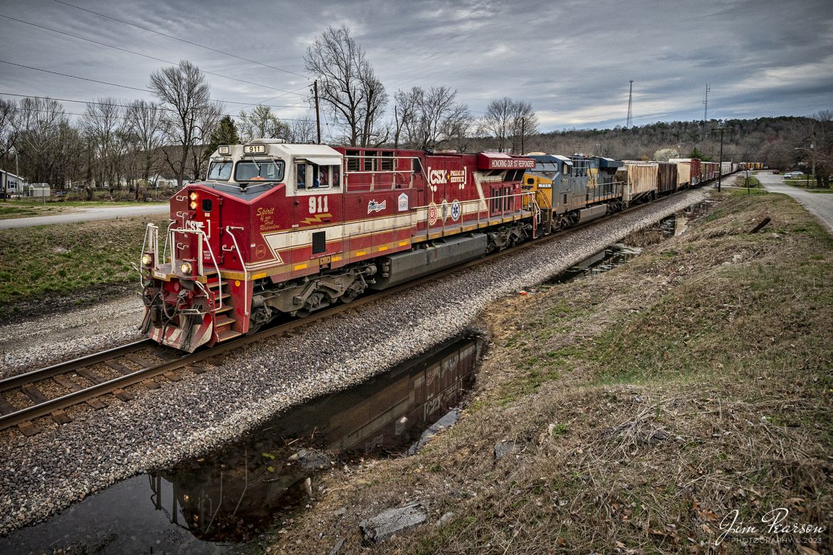 Northbound CSX M648 passes through Mortons Gap, Kentucky with the CSXT 911, Honoring First Responders locomotive leading, on the Henderson Subdivision on March 9th, 2023.

CSXT 911 is painted in vibrant red with white and gold striped accents along with the logo of program partners First Responders Childrens Foundation and Operation Gratitude. It also features generic police, fire and emergency medical services logos.

Tech Info: Nikon D800, RAW, Nikon 10-24 @ 10mm, f/5.6, 1/640, ISO 1250.

#trainphotography #railroadphotography #trains #railways #jimpearsonphotography #trainphotographer #railroadphotographer