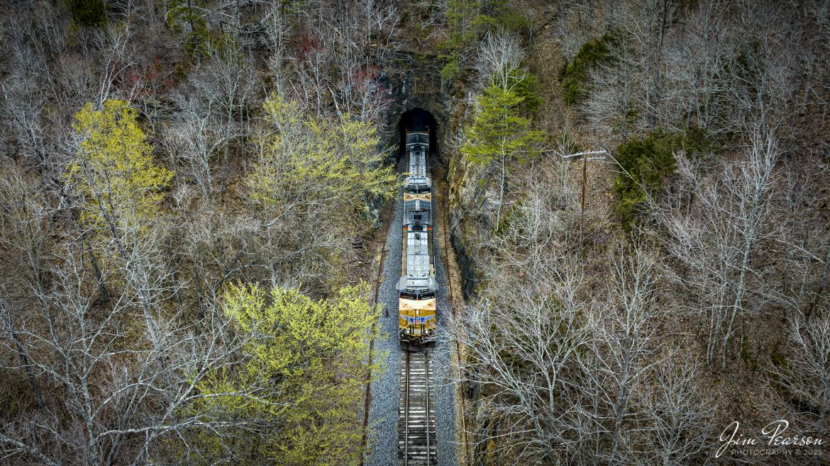 Southbound Union Pacific 8144 leads PAL WW1 as it exits the Paducah and Louisville Railway tunnel at Dawson Springs, Kentucky on its way south to Calvert City, Kentucky with a loaded coke train on March 13th, 2023.

Tech Info: DJI Mavic 3 Classic Drone, RAW, 24mm, f/2.8, 1/200, ISO 100.

#trainphotography #railroadphotography #trains #railways #dronephotography #trainphotographer #railroadphotographer #jimpearsonphotography #kentuckytrains #csx #csxrailway #csxhendersonsubdivision #barnsely #mavic3classic #drones #trainsfromtheair #trainsfromadrone #unionpacificrailroad #dawsonspringsky