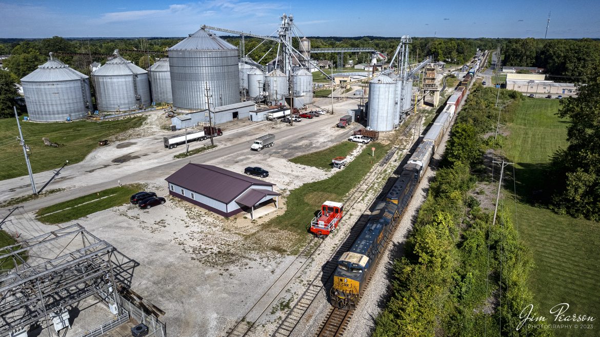 CSX M513 passes the Sullivan Grain Company and its Shuttlewagon Rail Car Mover, as it makes its way south on the CSX CE&D Subdivision at Sullivan, Indiana on September 22nd, 2022.

According to their website: Shuttlewagon is a direct-to-market provider of rail-based car handling solutions. Whether you require new equipment, service support, aftermarket parts or various on-site services rest assured Shuttlewagon is there to implement the right solution at the right moment in time so that your operations continue to propel your business forward.

Tech Info: DJI Mavic Air 2S Drone, 22mm, f/2.8, 1/4000, ISO 110.

#trainphotography #railroadphotography #trains #railways #dronephotography #trainphotographer #railroadphotographer #jimpearsonphotography #csxrailway #csxhendersonsubdivison #dronetrainphotography #trainsfromtheair