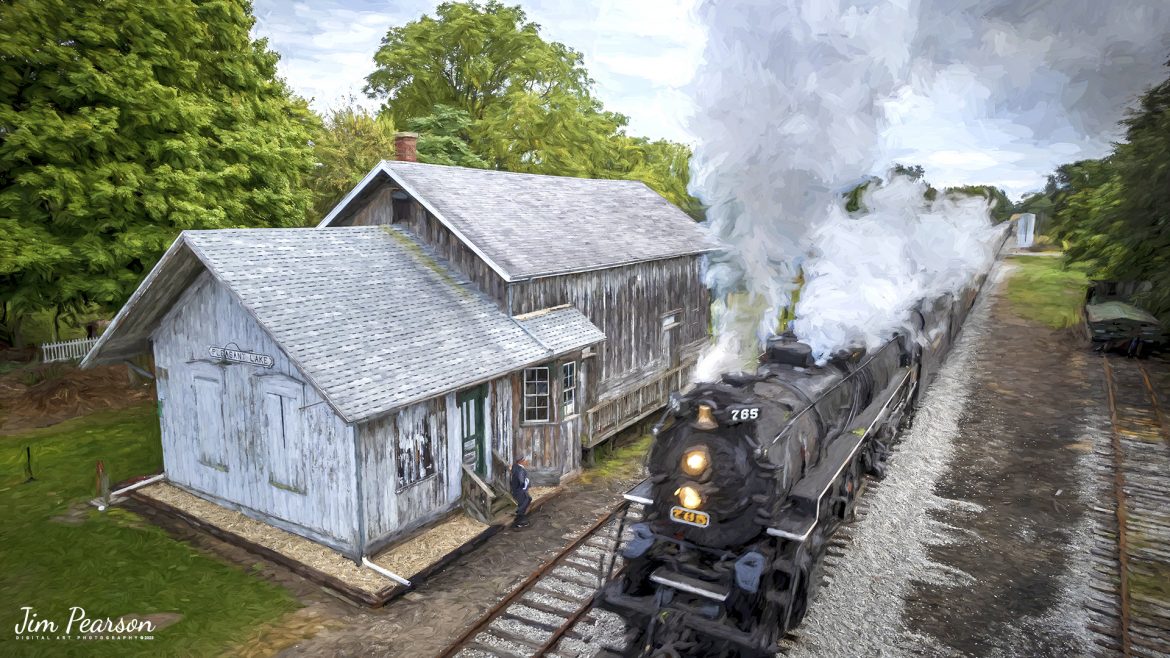 The American History Train, being led by Nickel Plate Road (NKP) steam locomotive 765, passes the old New York Central Depot on September 24th, 2022, at Pleasant Lake, Indiana.

NKP 765 was pulling the American History Train between Pleasant Lake from Angola, Indiana during the annual American History Days Festival. It took guests back to the 1940s for a living history experience. The passengers then got a 45-minute layover at Pleasant Lake where they visited with WWII reenactors, listened to live music and much more.

According to Wikipedia: Pleasant Lake depot is also known as the New York Central Railroad Depot and is a historic train station located at Pleasant Lake, Steuben Township, Steuben County, Indiana. It was built in 1882 by the Lake Shore and Michigan Southern Railway, and is a one-story, rectangular, Gothic Revival style frame building. It has a gable roof and is clad in board and batten siding.

It was listed on the National Register of Historic Places in 2001 as the Pleasant Lake Depot.

Nickel Plate Road 765 is a class "S-2" 2-8-4 "Berkshire" type steam locomotive built for the New York, Chicago & St. Louis Railroad, commonly referred to as the "Nickel Plate Road".

No. 765 continues to operate in mainline excursion service and is owned and maintained by the Fort Wayne Railroad Historical Society and was also added to the National Register of Historic Places on September 12, 1996.

Tech Info: DJI Mavic Air 2S Drone, 22mm, f/2.8, 1/100, ISO 110.

#trainphotography #railroadphotography #trains #railways #dronephotography #trainphotographer #railroadphotographer #jimpearsonphotography


Tech Info: DJI Mavic Air 2S Drone, 22mm, f/2.8, 1/640, ISO 100.