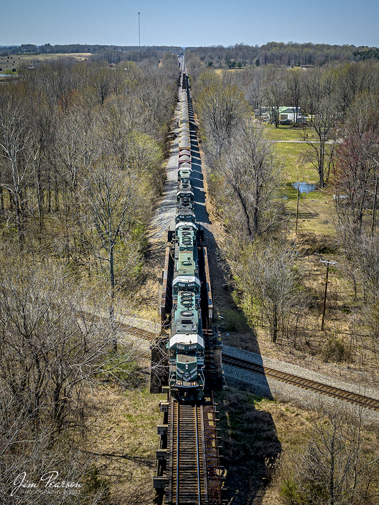 A set of six Paducah and Louisville GP-38s head north over the CSX Henderson Subdivision at Monarch in Madisonville, Ky with a mostly loaded rock train on March 30th, 2023. The power was PAL 2107, 2112, 2119, 3811, 2121 and one other unit.

Tech Info: DJI Mavic 3 Classic Drone, RAW, 24mm, f/2.8, 1/1600, ISO 140.

#trainphotography #railroadphotography #trains #railways #dronephotography #trainphotographer #railroadphotographer #jimpearsonphotography #kentuckytrains #csx #csxrailway #MadisonvilleKy #mavic3classic #drones #trainsfromtheair #trainsfromadrone #PaducahandLouisvilleRailway, PALrailway