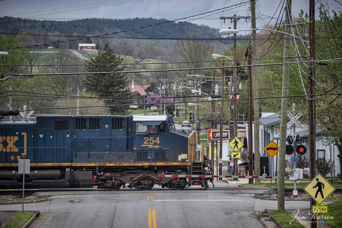 CSX M647 passes through the crossing in downtown Mortons Gap, Ky with CSXT 254 leading the way, as it heads south on the Henderson Subdivision on April 6th, 2023.

Tech Info: Nikon D800, RAW, Sigma 150-600mm @ 250mm, f/2.8, 1/500, ISO 400.

#trainphotography #railroadphotography #trains #railways #trainphotographer #railroadphotographer #jimpearsonphotography #csxhendersonsubdivision #csx #MortonsGapKy