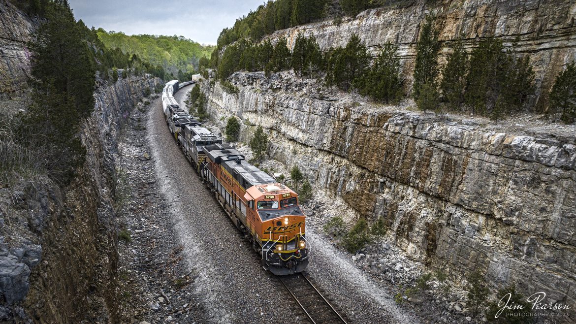 After a 1.5 hour wait, I caught Burlington Northern Santa Fe 6739 as it led Norfolk Southern 167, as it passes through the cut at Tunnel Hill on the NS Southern East District just north of Depauw, Indiana, as it makes its way east to Louisville, Ky on April 15th, 2023. This cut was made close to the old existing tunnel where the trains used to run.

Tech Info: DJI Mavic 3 Classic Drone, RAW, 24mm, f/2.8, 1/320 sec, ISO 200.

#trainphotography #railroadphotography #trains #railways #dronephotography #trainphotographer #railroadphotographer #jimpearsonphotography #kentuckytrains #csx #csxrailway #mavic3classic #drones #trainsfromtheair #trainsfromadrone #NSRailway, Depauw, Indiana Trains