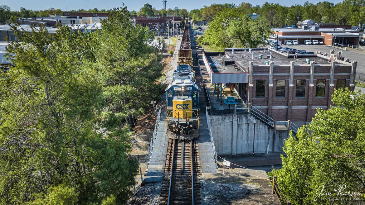 CSX 8882 leads rail train W010 as it passes the old Louisville and Nashville Railroad Depot at Madisonville, Kentucky on April 17th, 2023, as it heads north on the Henderson Subdivision.

This depot was originally dedicated in 1929 and last saw passenger service about 1968 when L&N built an office at Atkinson Yard in Madisonville and the passenger train service was moved to that location. Currently the station is owned by the city of Madisonville and houses one of the hubs of the Kentucky Innovation Stations, which helps courageous entrepreneurs, creative business founders, high-growth startups, working on their own success stories.

Tech Info: DJI Mavic 3 Classic Drone, RAW, 24mm, f/2.8, 1/1600 sec, ISO 170.

#trainphotography #railroadphotography #trains #railways #dronephotography #trainphotographer #railroadphotographer #jimpearsonphotography #kentuckytrains #mavic3classic #drones #trainsfromtheair #trainsfromadrone #MadisonvilleKY #L&NDepot #CSX #CSXhendersonsubdivision