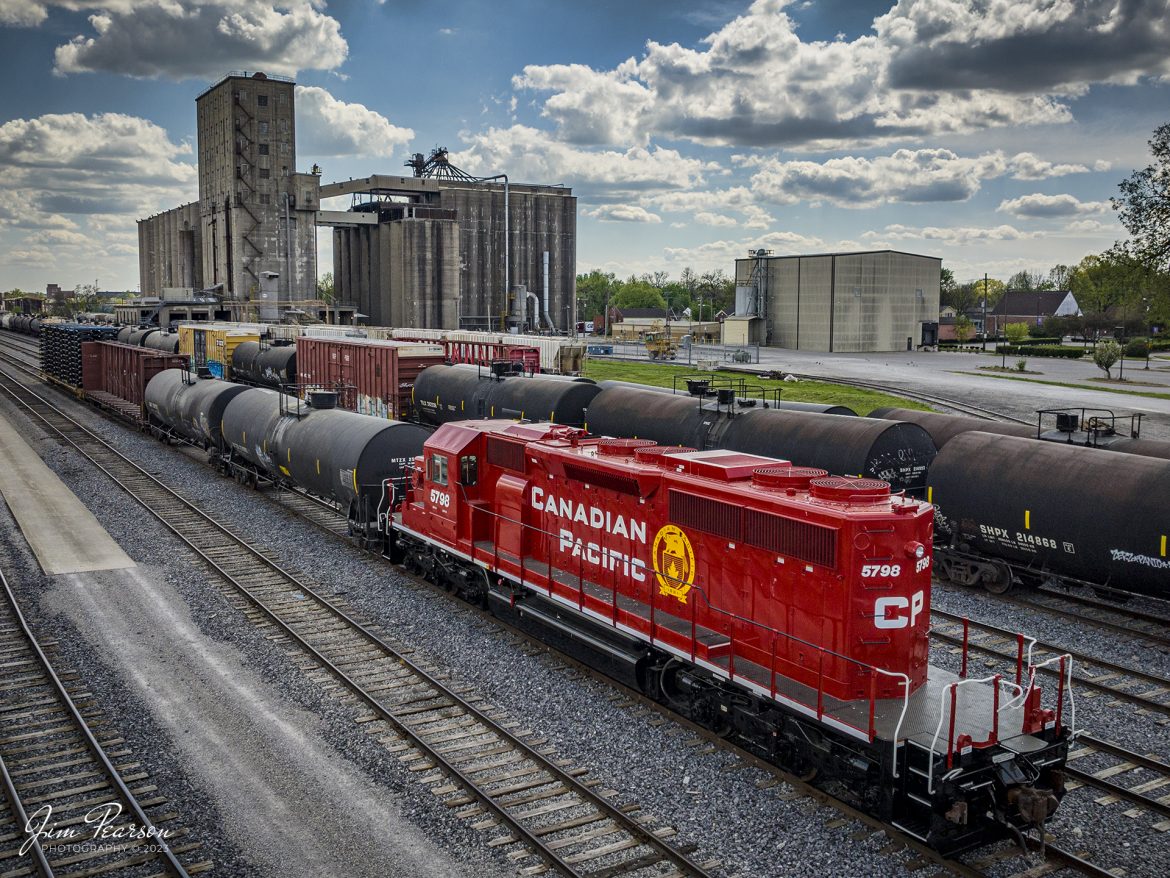 Newly painted and refurbished Canadian Pacific 5798 sits tied down in the Paducah and Louisville Railway Yard in Louisville, Kentucky on April 15th, 2023. The markings under the cab window are SD40-2 DRF-30. Not sure where it was rebuilt and what was done to it however, with the recent merger between the CP and KCS, the road name on this newly painted unit is now incorrect!

Tech Info: DJI Mavic 3 Classic Drone, RAW, 24mm, f/2.8, 1/3200 sec, ISO 280.

#trainphotography #railroadphotography #trains #railways #dronephotography #trainphotographer #railroadphotographer #jimpearsonphotography #kentuckytrains #mavic3classic #drones #trainsfromtheair #trainsfromadrone #CPRailway #Jeffersonville #CanadianPacific