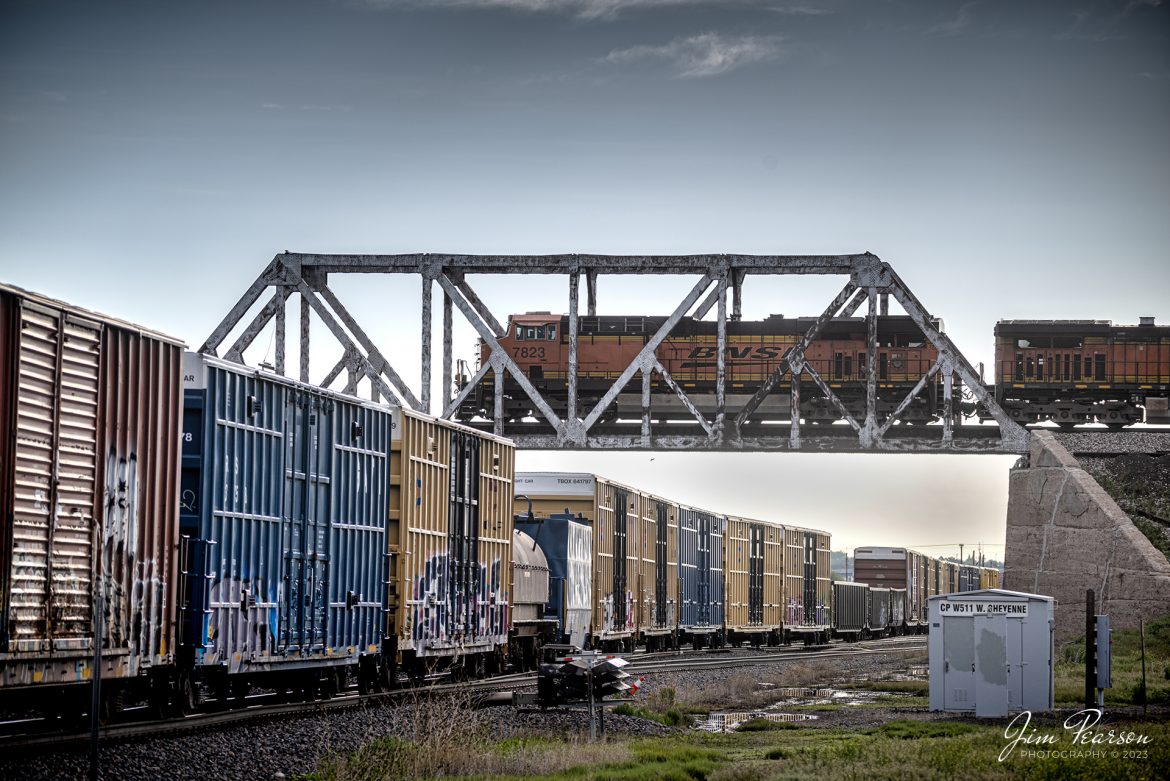 A BNSF mixed freight on the overpass for the Front Range Subdivision, passes over a westbound UP train westbound coming out of the yard at Cheyenne, Wyoming, on the Laramie Subdivision on the morning of March 18th, 2023.

Tech Info: Nikon D800, RAW, Sigma 150-600 @150mm, f/5.6, 1/500, ISO 320.

#trainphotography #railroadphotography #trains #railways #dronephotography #trainphotographer #railroadphotographer #jimpearsonphotography #UPtrains #NikonD800 #UnionPacific #WyomingTrains #