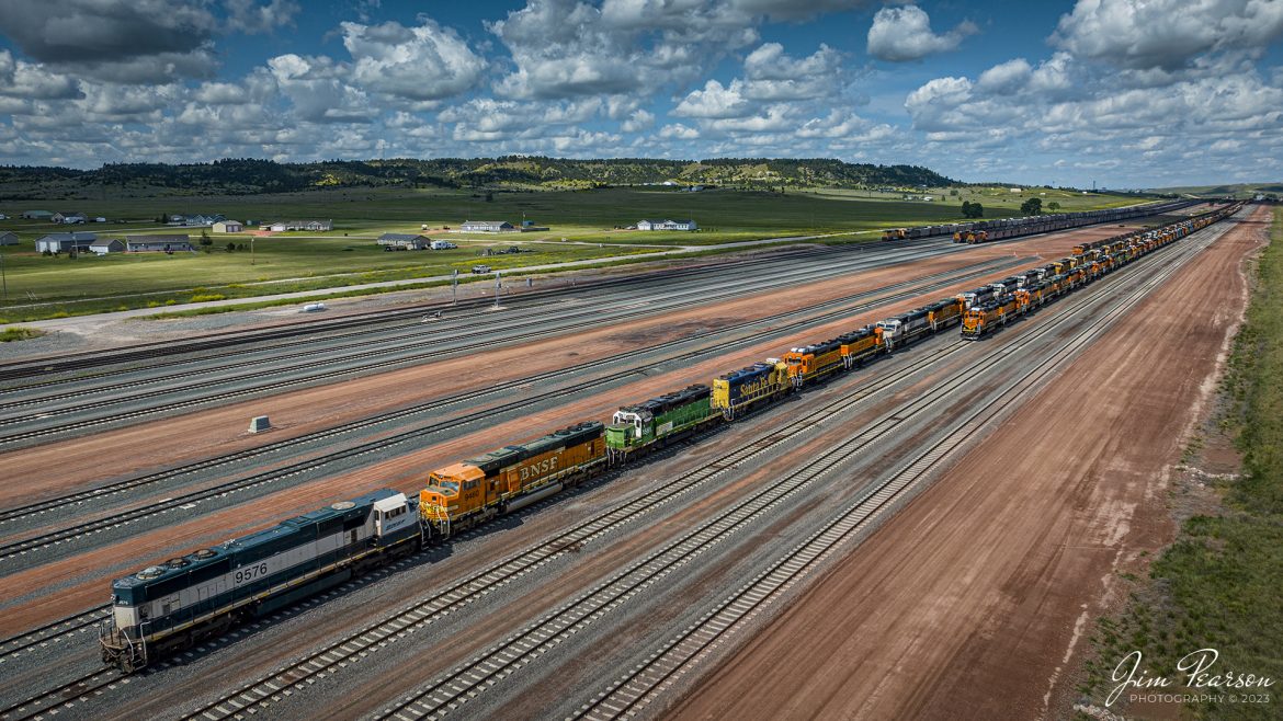 On June 28th, 2023, I tried to count the locomotives stored on the Black Hills Subdivision at the BNSF Donkey Creek Yard at Rozet, Wyoming in the two lines of locomotives from this picture, but there’s too many and seem to go on forever. The trains on the far left are coal trains, loaded and empty, waiting on crews.