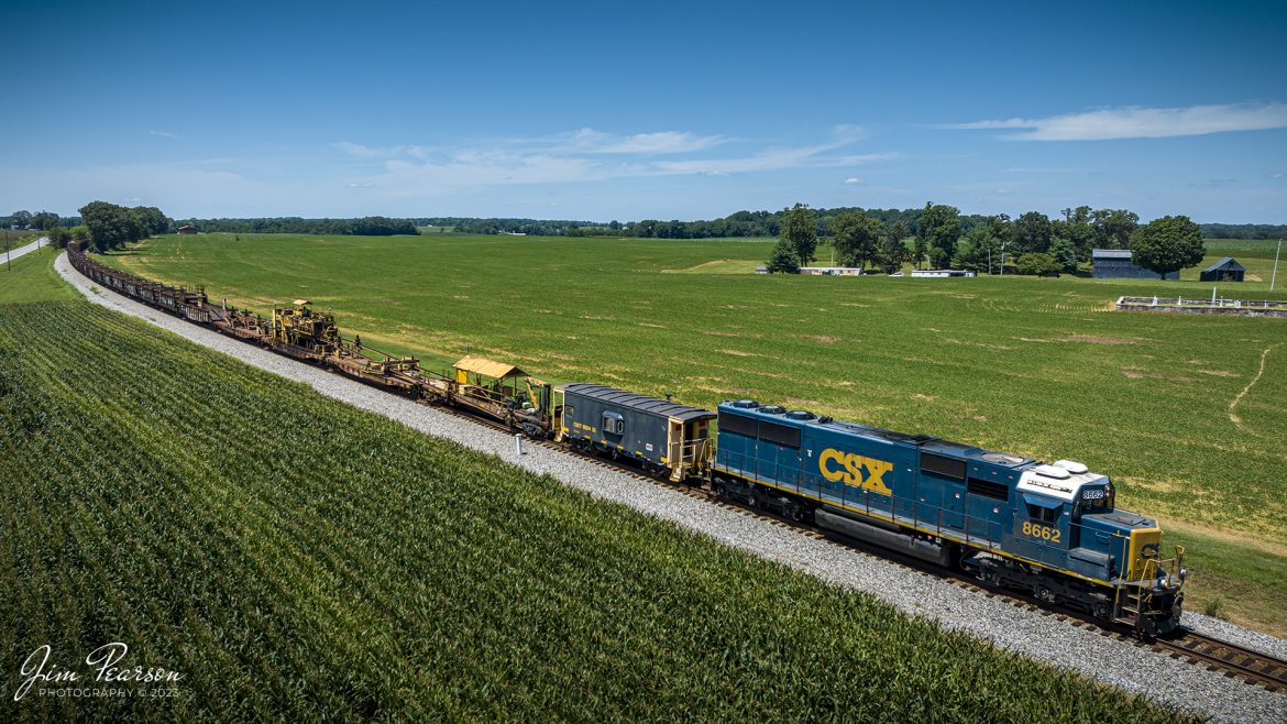 CSX rail train W471 rounds the curve leading to the Red River bridge at Adams, Tennessee, as it heads south on the Henderson Subdivision on July 31st, 2023. The train and its crew were bound for Cedar Hill, TN where they spent the afternoon picking up used rail along the right of way there.

Tech Info: DJI Mavic 3 Classic Drone, RAW, 24mm, f/2.8, 1/1250, ISO 100.

#trainphotography #railroadphotography #trains #railways #dronephotography #trainphotographer #railroadphotographer #jimpearsonphotography #trains #csxt #mavic3classic #drones #trainsfromtheair #trainsfromadrone #AdamsTN