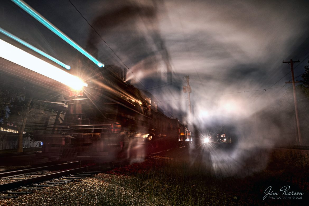 There was a lot of luck that went into making this image of Steam locomotive Frisco 1630 at the Illinois Railway Museum (IRM) during their 70th anniversary weekend in Union, Illinois. 

In between the spitting rain on Saturday night, September 16th, 2023, I along with many other photographers were working on photographing the 1630 as it sat at the depot at IRM waiting for its next run. I was working with my D800 on a tripod shooting available light shots at 30 seconds each at f/4 with my Nikon 10-24mm lens, when several things happened. 

I started the 30 second exposure and about 20 seconds into the exposure the train started to depart the station, resulting in the streaks you see of the headlight and marker lights on 1630. At the same time, I had a trolly come to a stop, which you see in the circle of smoke and the headlight star in the distance is from the Nebraska Zephyr waiting to enter the station after the Frisco departs. The headlight from the Zephyr illuminated the steam surrounding the scene, providing an effect that would be hard replicate, let along plan! Sometimes, I just get lucky!

According to IRM website: St. Louis  San Francisco Railroad (Frisco) 1630 is the museums most famous steam engine. A Russian Decapod, it was built in 1918 for export to Russia but was embargoed when the Bolshevik Revolution took place. Instead, the newly completed engine was sold to the Frisco, which used it in both freight and passenger service into the 1950s. The Frisco later sold it to Eagle-Picher Mining, where it saw use hauling freight and aggregate trains until the mid-1960s. It arrived at the IRM in 1967.

Tech Info: Nikon D800, RAW, Nikon 10-24 @15mm, f/5.6, 30 Seconds, ISO 100.

#trainphotography #railroadphotography #trains #railways #dronephotography #trainphotographer #railroadphotographer #jimpearsonphotography #UPtrains #NikonD800 #IllinoisRailwayMuseum #Frisco1630 #trainsatnight #illinoistrains #steamtrains