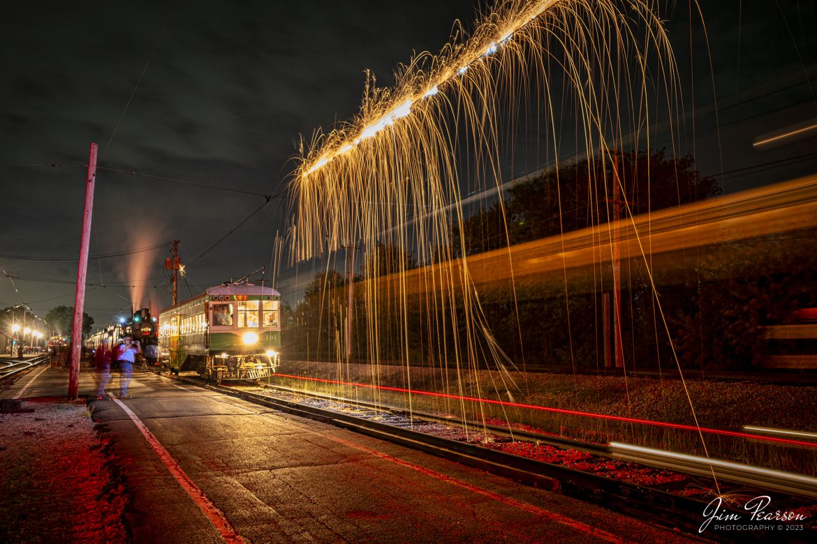 Illinois Terminal interurban coach 101 waits to depart as another Interurban puts on a light show as it pulls from the depot at the Illinois Railway Museum (IRM) on the wet and rainy evening of September 16th, 2023. Behind 101 is Frisco 1630 waiting to pull forward after 101 departs, during the IRM 70th Anniversary at Union, Illinois.

According to the IRM website: Illinois Terminal 101 is a rare example of a center-entrance interurban coach. It operated its entire service life between St. Louis, Missouri and Alton, Illinois. These cars were built for high-speed operation and were known as “Yellowhammers” and “Alton High-speeds.” The car has been restored to its appearance in the mid-1950s.

Tech Info: Nikon D800, RAW, Nikon 10-24 @18mm, f/4.52, 30 Seconds, ISO 100.

#trainphotography #railroadphotography #trains #railways #dronephotography #trainphotographer #railroadphotographer #jimpearsonphotography #UPtrains #NikonD800 #IllinoisRailwayMuseum #trainsinbadweather #illinoistrains #interurbancoach #streetcars #trainsatnight