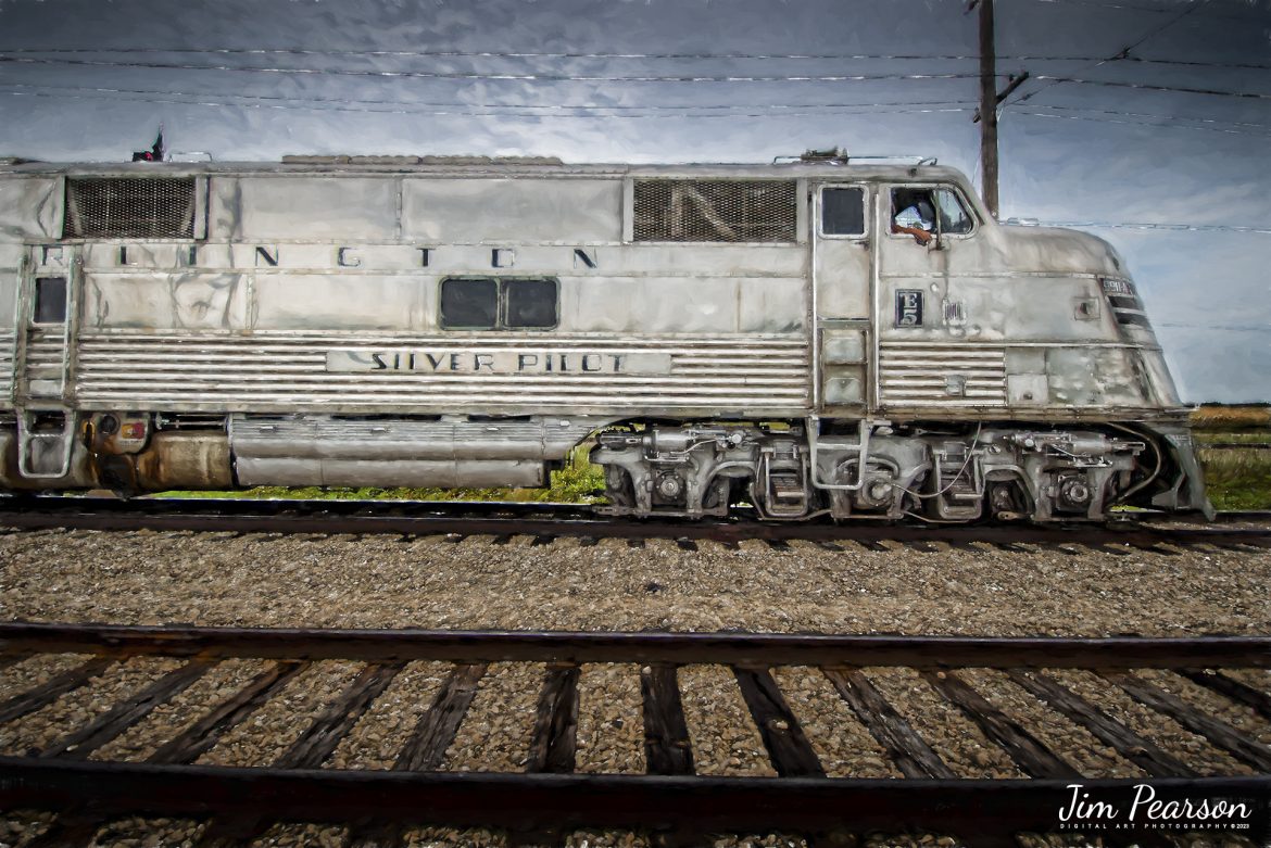 Digital Photo Art  Chicago Burlington & Quincy Railroad Nebraska Zephyr Silver Pilot at the Illinois Railway Museum (IRM), Union, Illinois on September 16th, 2023.

According to the IRM website: The Nebraska Zephyr is the most famous train at the Illinois Railway Museum. It is an articulated streamlined train built entirely of stainless steel. The train is known as the Train of the Goddesses because each of its five cars is named after a classical deity. It is the only complete Zephyr train from the Chicago Burlington & Quincy Railroad in operation today.

When it was built, the Nebraska Zephyr was pulled by a two-unit set of shovel nose diesels. In later years it was commonly hauled by stainless steel E5 passenger diesels, and today the train is still hauled by the last surviving E5, CB&Q 9911A Silver Pilot. The train set itself consists of the following five cars:

Tech Info: Nikon D800, Nikon 10-24 @ 10mm, f/3.5, 1/1250, ISO 100.

#trainphotography #railroadphotography #trains #railways #trainphotographer #railroadphotographer #jimpearsonphotography #NebraskaZephyr #IllinoisRailwayMuseum #digitalphotoart