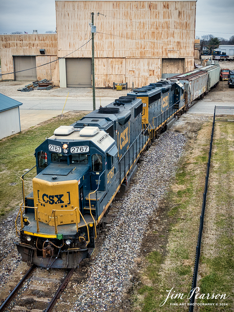 CSX L364-01 drops off three flats loaded with steel at Wabash Steel Company along the Wabash River, along the CSX River Branch on January 1st, 2024.

Tech Info: DJI Mavic 3 Classic Drone, RAW, 22mm, f/2.8, 1/240, ISO 110.

#railroad #railroads #train #trains #bestphoto #railroadengines #picturesoftrains #picturesofrailway #bestphotograph #photographyoftrains #trainphotography #JimPearsonPhotography #csxillinoissubdivision #csxt