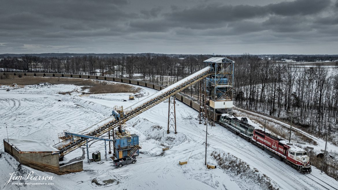 Paducah and Louisville Railway University of Louisville Locomotive 2013 and 4503 pull their empty coal train under the coaling temple at the Warrior Coal Mine loop, outside of Nebo, Kentucky as they start to load another train bound for the Louisville Gas & Electric power plant, outside of Louisville, Ky on January 15th, 2024.

Tech Info: DJI Mavic 3 Classic Drone, RAW, 22mm, f/2.8, 1/1600, ISO 100.

#railroad #railroads #train #trains #bestphoto #railroadengines #picturesoftrains #picturesofrailway #bestphotograph #photographyoftrains #trainphotography #JimPearsonPhotography #PaucahandLouisvillerailway #tending