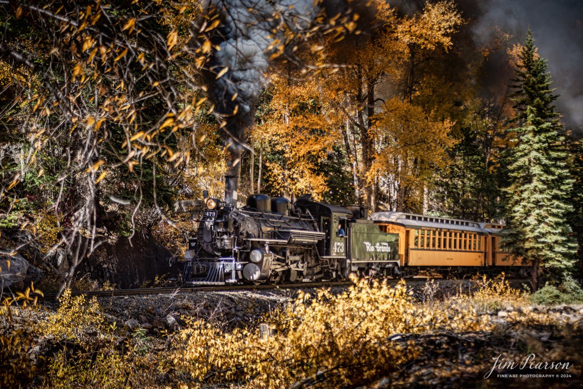 Durango and Silverton Narrow Gauge steam locomotive D&RGW 473 pulls through the fall countryside with a passenger train as it heads to Durango, Colorado, on October 17th, 2023.

According to Wikipedia: The Durango and Silverton Narrow Gauge Railroad, often abbreviated as the D&SNG, is a 3 ft (914 mm) narrow-gauge heritage railroad that operates on 45.2 mi (72.7 km) of track between Durango and Silverton, in the U.S. state of Colorado. The railway is a federally designated National Historic Landmark and was also designated by the American Society of Civil Engineers as a National Historic Civil Engineering Landmark in 1968.

Tech Info: DJI Mavic 3 Classic Drone, RAW, 22mm, f/2.8, 1/1000, ISO 72.

#railroad #railroads #train, #trains #bestphoto #soldphoto #railway #railway #soldtrainphotos #steamtrains #railtransport #railroadengines #picturesoftrains #picturesofrailways #besttrainphotograph #bestphoto #photographyoftrains #steamtrainphotography #soldpicture #bestsoldpicture #JimPearsonPhotography #DurangoandSilvertonRailroad