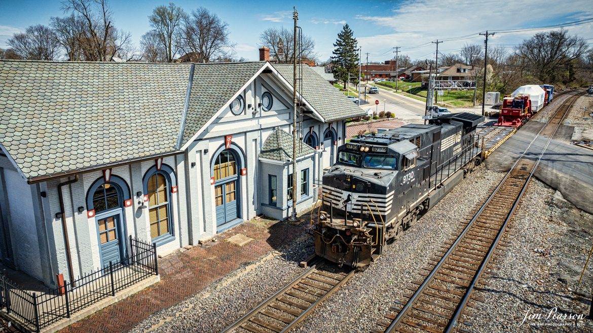 Northbound Norfolk Southern 3730 leads CSX S991 as they pass the old depot with an oversized Turbine load from Siemens Energy on a depressed flatbed at Princeton, Indiana, on the CSX CE&D Subdivision, on March 20th, 2024, with a Fracht Caboose bringing up the rear. 

It originated at Birmingham, AL and is headed for New Castle, PA. I caught this move just north of Evansville, IN and gave chase to Patoka, Indiana, so stay tuned as I’ll be posting more images of it next week!

The depot was built in 1875 and has been beautifully restored. Once housing the C&EI and L&N railways, it was the lifeline of commerce and transportation for the county. Passenger service was discontinued in the late 1960s. The Princeton Train Depot is now home to the Gibson County Visitors Center and features a railway museum with a restored train caboose.

Tech Info: DJI Mavic 3 Classic Drone, RAW, 22mm, f/2.8, 1/2000, ISO 100.

#trainphotography #railroadphotography #trains #railways #jimpearsonphotography #trainphotographer #railroadphotographer #csxt #dronephoto #trainsfromadrone #trending #csxcedsubdivision #norfolksouthern #trending